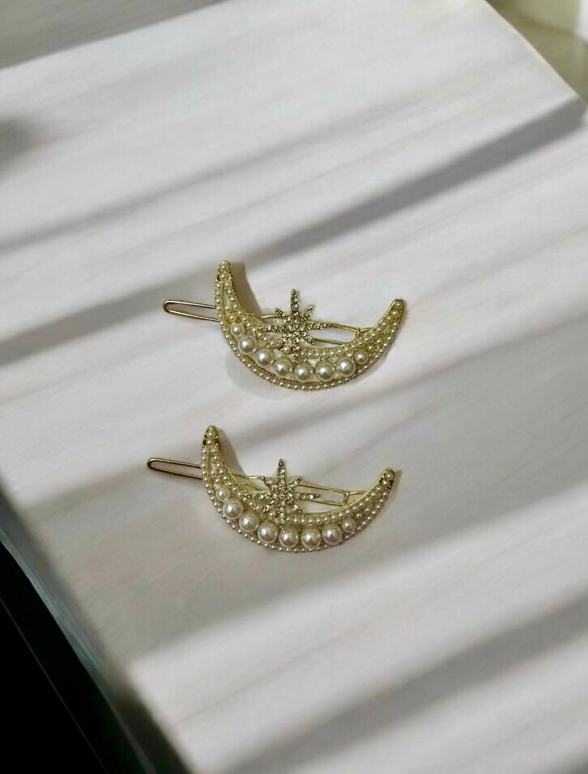 Hair Accessory in the shape of a crescent moon with a sun star ( 1 piece )