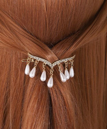 Hair Accessory Gold containing dangling beads