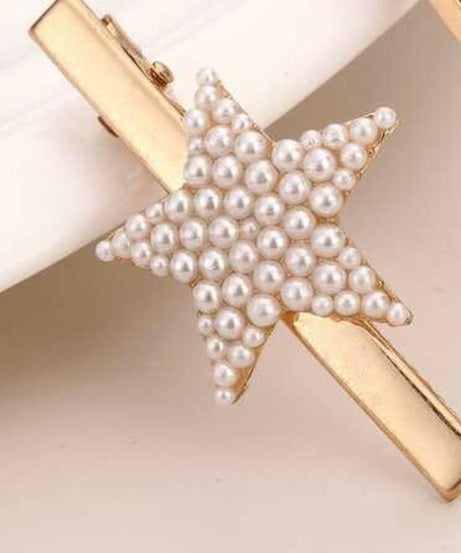 Hair Accessory Golden in the shape of a star ( 1 piece )