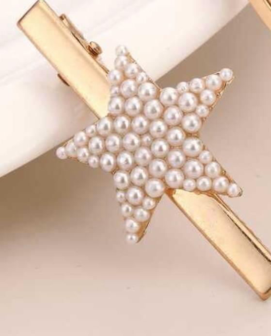 Hair Accessory Golden in the shape of a star ( 1 piece )