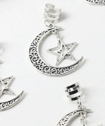 Hair Accessory Silver in the shape of a crescent moon containing a star (3 pieces)