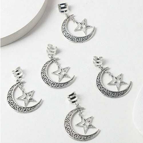 Hair Accessory Silver in the shape of a crescent moon containing a star (3 pieces)