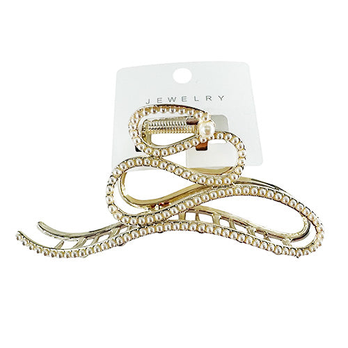 Gold hair clip studded with rhinestones