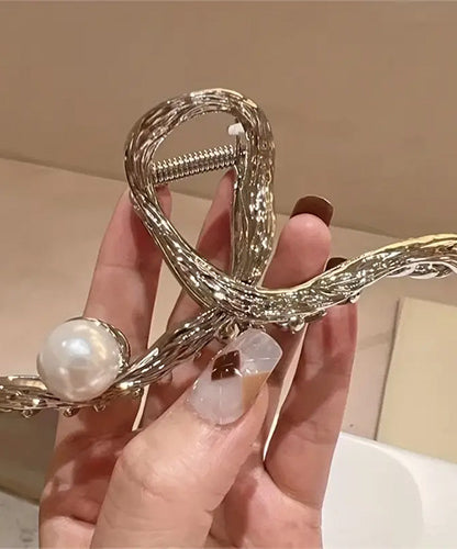 Hair Clip Golden with a rhinestone on the tip