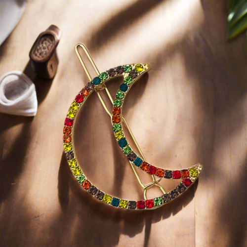 Multi-colored crescent-shaped hair accessory