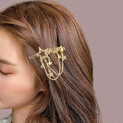 Gold hair accessory in the shape of stars with chains hanging from them