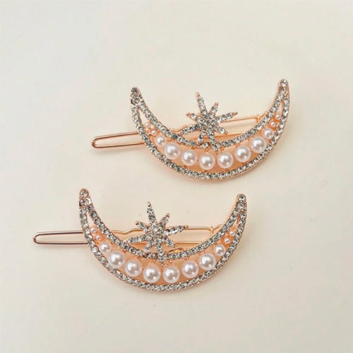 Hair Accessory in the shape of a crescent moon with a sun star ( 1 piece )