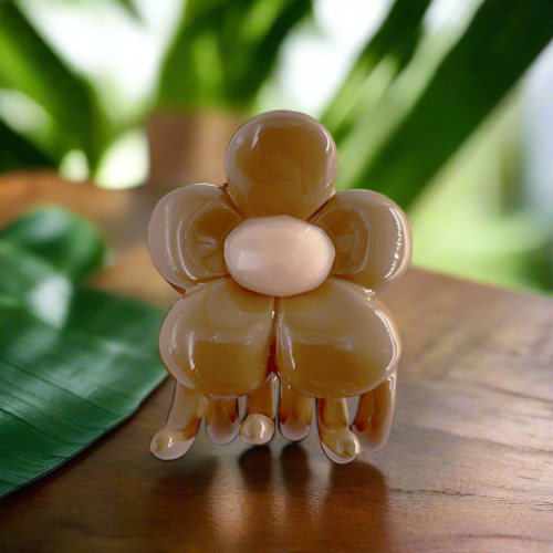 Hair Clip Beige in the shape of a rose with a rhinestone in the middle