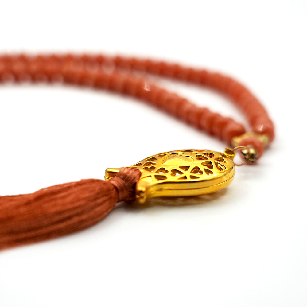 مسبحة برتقالي بني طويل